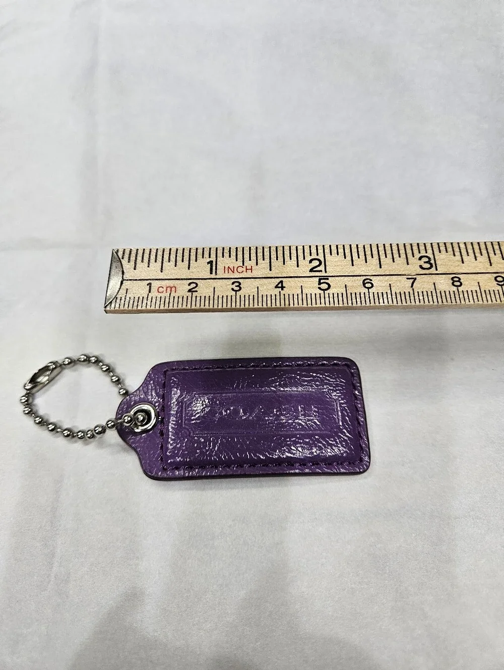 Coach Purple Patent Leather Hangtag